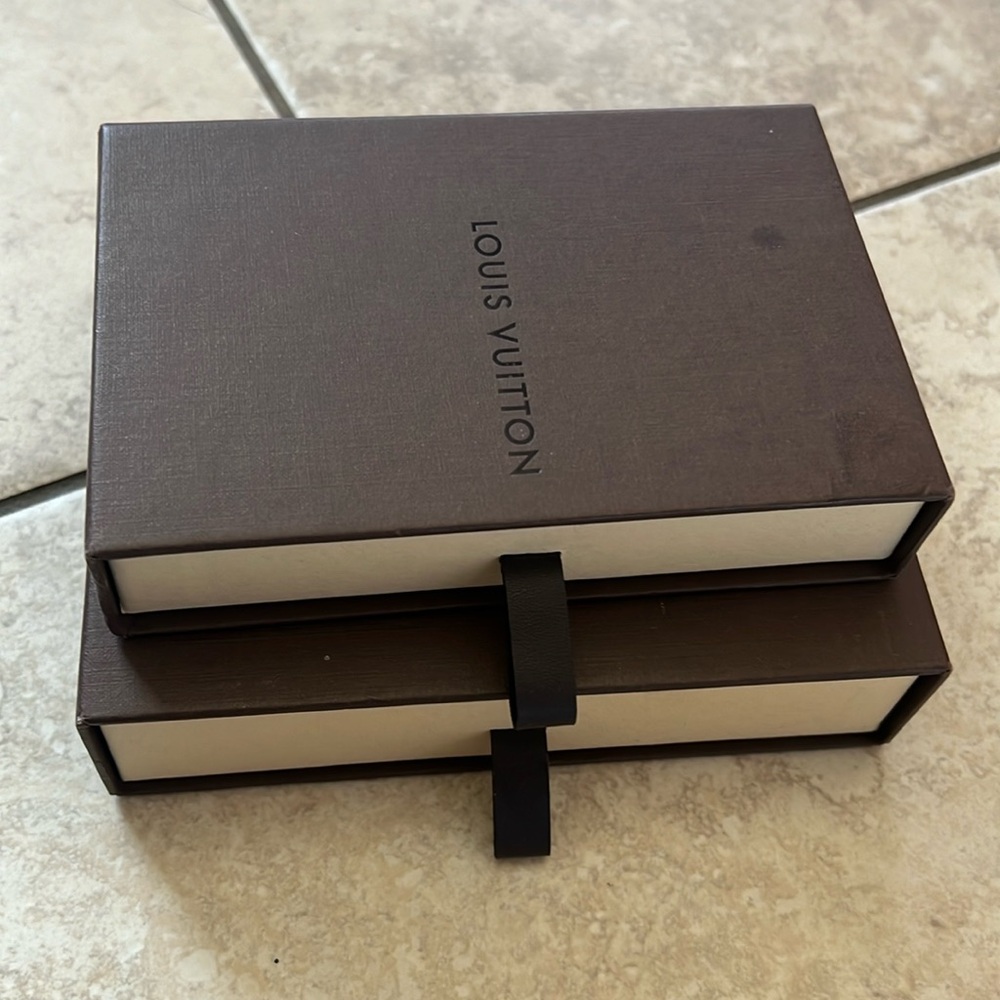 Two authentic Louis Vuitton gift/storage boxes.